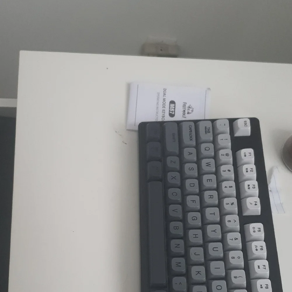 A Freewolf M87 Moonlight Keyboard With The Box And Everything